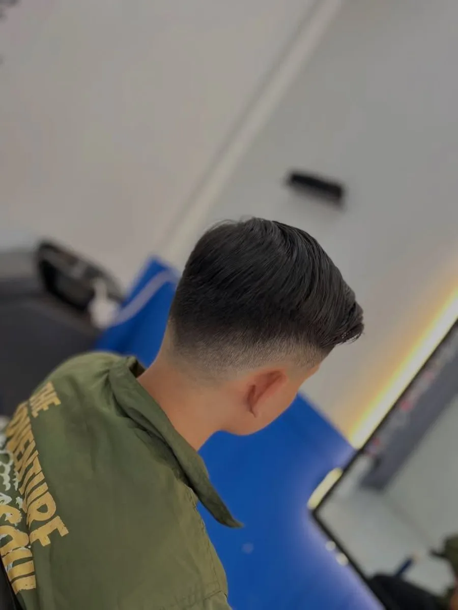 Hasil potongan rambut pria dengan gradasi rapi di Tentrem Barbershop